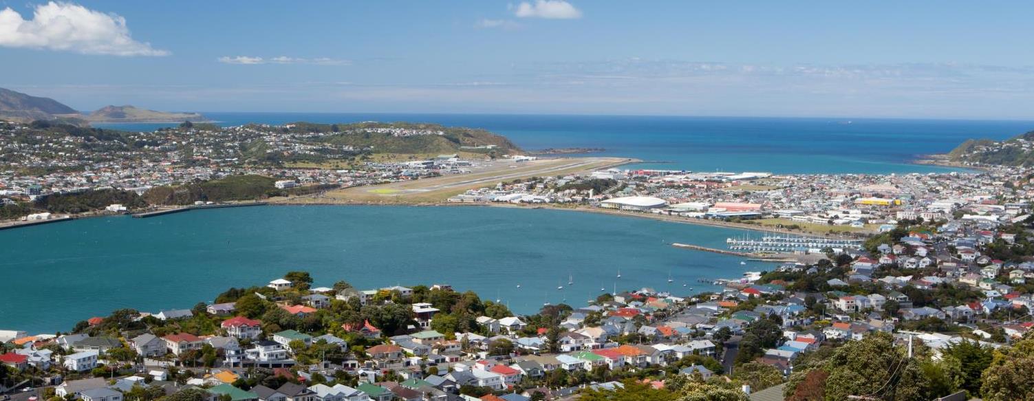 Aerial view of bay with runway in the background