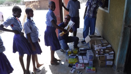 Handing out school supplies at Nakukulas Primary School